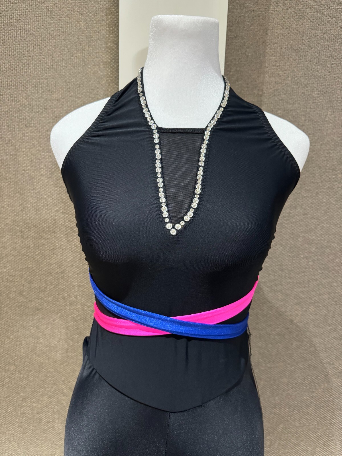 COMPLETELY CUSTOM BLACK UNITARD WITH BRIGHT BLUE AND PINK STRAPS IN AXS